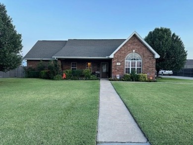 The home at 207 Redwood Drive is located near the Crystal Beach on Woodward Municipal Golf Course in Oklahoma - for sale on GolfHomes.com, golf home, golf lot