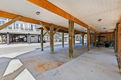 STUNNING 4 BED/4 BATH LAKEFRONT RAISED BEACH HOUSE WITH TONS OF on Prestwick Country Club in South Carolina - for sale on GolfHomes.com, golf home, golf lot