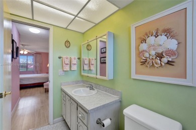 Stunning water & golf course views!  1-bed, 1.5-bath condo in on Sunrise Lakes Phase III in Florida - for sale on GolfHomes.com, golf home, golf lot