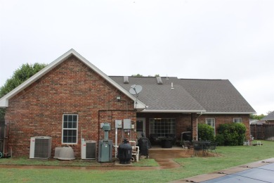 The home at 207 Redwood Drive is located near the Crystal Beach on Woodward Municipal Golf Course in Oklahoma - for sale on GolfHomes.com, golf home, golf lot