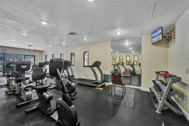 Stunning water & golf course views!  1-bed, 1.5-bath condo in on Sunrise Lakes Phase III in Florida - for sale on GolfHomes.com, golf home, golf lot