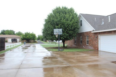 The home at 207 Redwood Drive is located near the Crystal Beach on Woodward Municipal Golf Course in Oklahoma - for sale on GolfHomes.com, golf home, golf lot