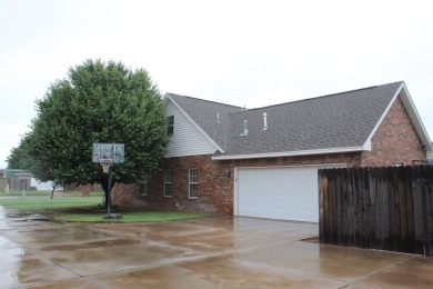 The home at 207 Redwood Drive is located near the Crystal Beach on Woodward Municipal Golf Course in Oklahoma - for sale on GolfHomes.com, golf home, golf lot