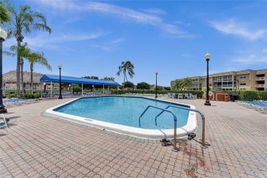 Stunning water & golf course views!  1-bed, 1.5-bath condo in on Sunrise Lakes Phase III in Florida - for sale on GolfHomes.com, golf home, golf lot