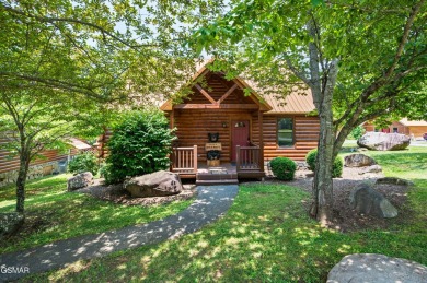 Welcome to Grin and Bear It. This amazing three bedroom, two and on Bent Creek Golf Course in Tennessee - for sale on GolfHomes.com, golf home, golf lot