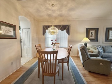 This St. Ives floor plan with screened in LANDSCAPED courtyard on Kings Ridge Golf Club in Florida - for sale on GolfHomes.com, golf home, golf lot