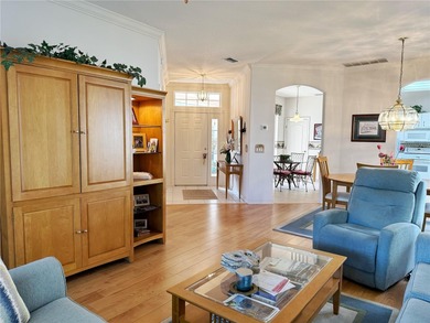 This St. Ives floor plan with screened in LANDSCAPED courtyard on Kings Ridge Golf Club in Florida - for sale on GolfHomes.com, golf home, golf lot