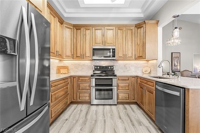 Welcome to the attached VILLA that outshines them all - on Fiddlesticks Country Club in Florida - for sale on GolfHomes.com, golf home, golf lot