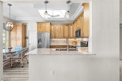 Welcome to the attached VILLA that outshines them all - on Fiddlesticks Country Club in Florida - for sale on GolfHomes.com, golf home, golf lot