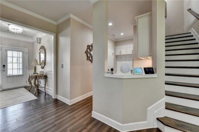 Nestled in a serene cul-de-sac, this meticulously maintained on Reunion Golf Club in Georgia - for sale on GolfHomes.com, golf home, golf lot