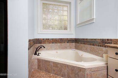 Every inch of this beautifully crafted home tells a story of on Harbour Point Golf Club in North Carolina - for sale on GolfHomes.com, golf home, golf lot