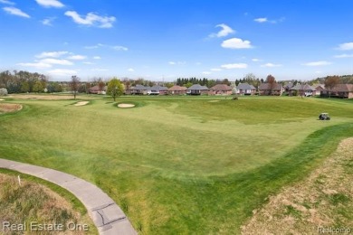 Custom built ranch with finished basement & a covered 288 sf on The Orchards Golf Club in Michigan - for sale on GolfHomes.com, golf home, golf lot