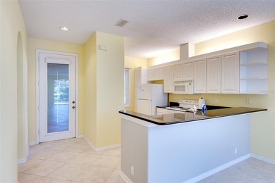 One or more photo(s) has been virtually staged. Some photos have on Rosedale Golf and Tennis Club in Florida - for sale on GolfHomes.com, golf home, golf lot