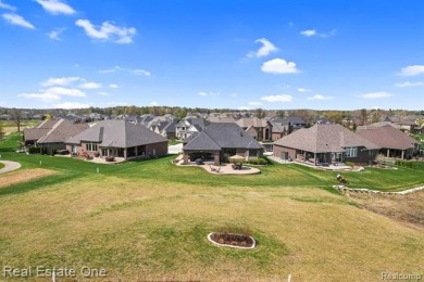 Custom built ranch with finished basement & a covered 288 sf on The Orchards Golf Club in Michigan - for sale on GolfHomes.com, golf home, golf lot