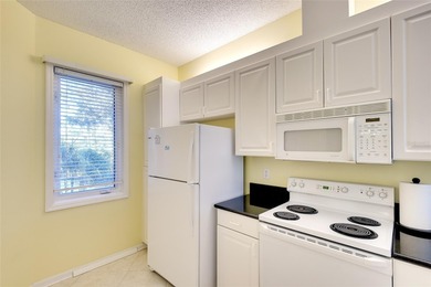 One or more photo(s) has been virtually staged. Some photos have on Rosedale Golf and Tennis Club in Florida - for sale on GolfHomes.com, golf home, golf lot