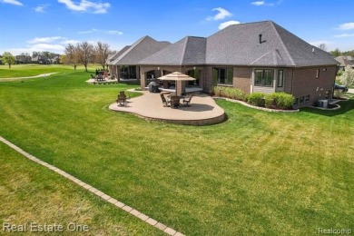 Custom built ranch with finished basement & a covered 288 sf on The Orchards Golf Club in Michigan - for sale on GolfHomes.com, golf home, golf lot