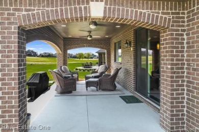 Custom built ranch with finished basement & a covered 288 sf on The Orchards Golf Club in Michigan - for sale on GolfHomes.com, golf home, golf lot