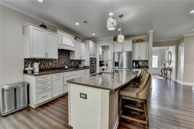 Nestled in a serene cul-de-sac, this meticulously maintained on Reunion Golf Club in Georgia - for sale on GolfHomes.com, golf home, golf lot