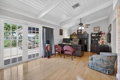 Welcome to this exceptional residence where charm, comfort, and on Woodmont Country Club in Florida - for sale on GolfHomes.com, golf home, golf lot