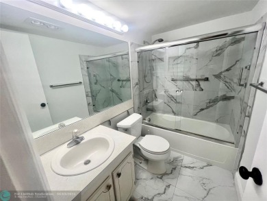 GREAT ***INVESTMENT PROPERTY***! TENANT CURRENTLY IN PLACE on Hillsboro Pines Golf in Florida - for sale on GolfHomes.com, golf home, golf lot