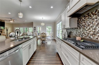 Nestled in a serene cul-de-sac, this meticulously maintained on Reunion Golf Club in Georgia - for sale on GolfHomes.com, golf home, golf lot