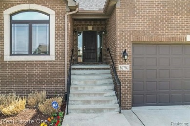 Custom built ranch with finished basement & a covered 288 sf on The Orchards Golf Club in Michigan - for sale on GolfHomes.com, golf home, golf lot