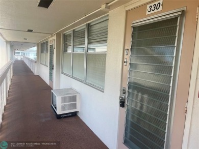 GREAT ***INVESTMENT PROPERTY***! TENANT CURRENTLY IN PLACE on Hillsboro Pines Golf in Florida - for sale on GolfHomes.com, golf home, golf lot