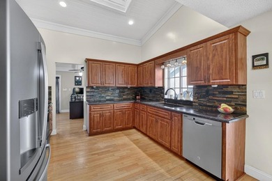 Welcome to this exceptional residence where charm, comfort, and on Woodmont Country Club in Florida - for sale on GolfHomes.com, golf home, golf lot