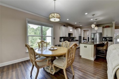 Nestled in a serene cul-de-sac, this meticulously maintained on Reunion Golf Club in Georgia - for sale on GolfHomes.com, golf home, golf lot