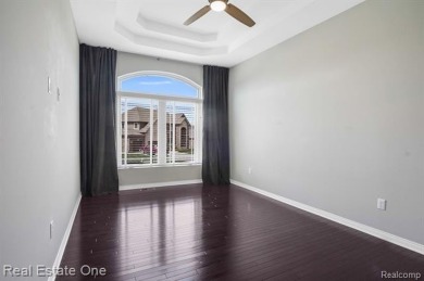 Custom built ranch with finished basement & a covered 288 sf on The Orchards Golf Club in Michigan - for sale on GolfHomes.com, golf home, golf lot
