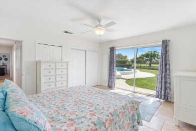 This charming 5-bedroom home offers a perfect blend of comfort on Atlantis Golf Club in Florida - for sale on GolfHomes.com, golf home, golf lot