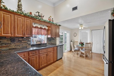 Welcome to this exceptional residence where charm, comfort, and on Woodmont Country Club in Florida - for sale on GolfHomes.com, golf home, golf lot