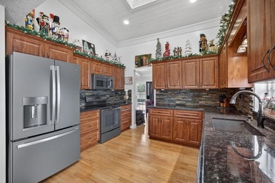 Welcome to this exceptional residence where charm, comfort, and on Woodmont Country Club in Florida - for sale on GolfHomes.com, golf home, golf lot