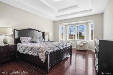 Custom built ranch with finished basement & a covered 288 sf on The Orchards Golf Club in Michigan - for sale on GolfHomes.com, golf home, golf lot
