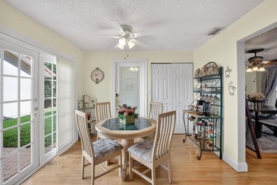 Welcome to this exceptional residence where charm, comfort, and on Woodmont Country Club in Florida - for sale on GolfHomes.com, golf home, golf lot