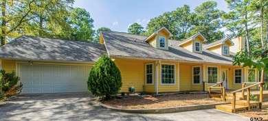 Sit on the front porch of this spacious, charming house and on Holly Lake Ranch Golf Club in Texas - for sale on GolfHomes.com, golf home, golf lot
