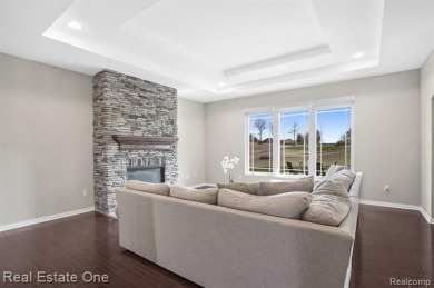 Custom built ranch with finished basement & a covered 288 sf on The Orchards Golf Club in Michigan - for sale on GolfHomes.com, golf home, golf lot