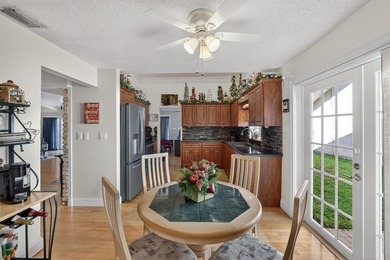 Welcome to this exceptional residence where charm, comfort, and on Woodmont Country Club in Florida - for sale on GolfHomes.com, golf home, golf lot