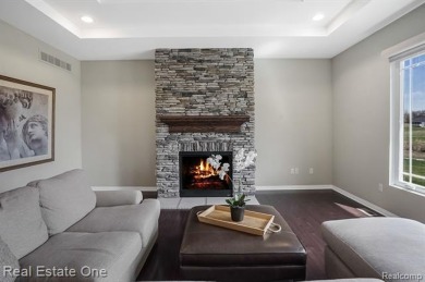 Custom built ranch with finished basement & a covered 288 sf on The Orchards Golf Club in Michigan - for sale on GolfHomes.com, golf home, golf lot