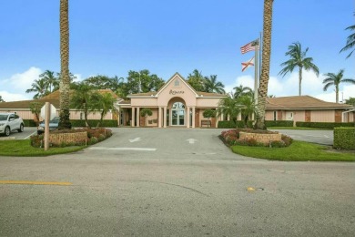 This charming 5-bedroom home offers a perfect blend of comfort on Atlantis Golf Club in Florida - for sale on GolfHomes.com, golf home, golf lot