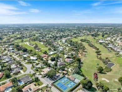 This charming 5-bedroom home offers a perfect blend of comfort on Atlantis Golf Club in Florida - for sale on GolfHomes.com, golf home, golf lot