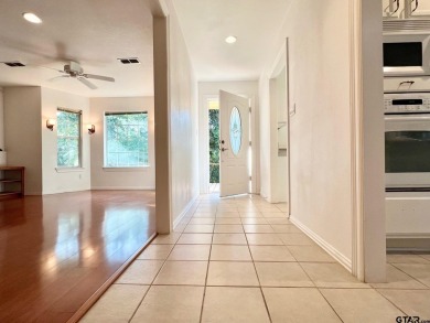 Sit on the front porch of this spacious, charming house and on Holly Lake Ranch Golf Club in Texas - for sale on GolfHomes.com, golf home, golf lot