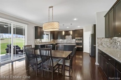 Custom built ranch with finished basement & a covered 288 sf on The Orchards Golf Club in Michigan - for sale on GolfHomes.com, golf home, golf lot