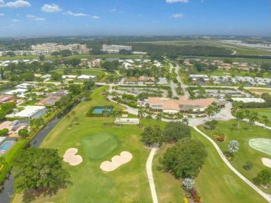 This charming 5-bedroom home offers a perfect blend of comfort on Atlantis Golf Club in Florida - for sale on GolfHomes.com, golf home, golf lot