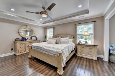 Nestled in a serene cul-de-sac, this meticulously maintained on Reunion Golf Club in Georgia - for sale on GolfHomes.com, golf home, golf lot
