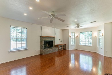 Sit on the front porch of this spacious, charming house and on Holly Lake Ranch Golf Club in Texas - for sale on GolfHomes.com, golf home, golf lot