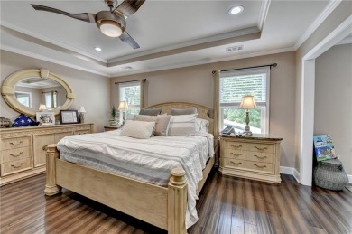 Nestled in a serene cul-de-sac, this meticulously maintained on Reunion Golf Club in Georgia - for sale on GolfHomes.com, golf home, golf lot