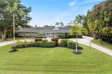 This charming 5-bedroom home offers a perfect blend of comfort on Atlantis Golf Club in Florida - for sale on GolfHomes.com, golf home, golf lot