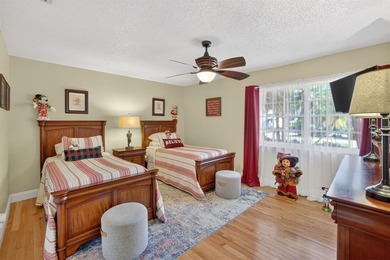 Welcome to this exceptional residence where charm, comfort, and on Woodmont Country Club in Florida - for sale on GolfHomes.com, golf home, golf lot