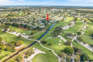 This charming 5-bedroom home offers a perfect blend of comfort on Atlantis Golf Club in Florida - for sale on GolfHomes.com, golf home, golf lot